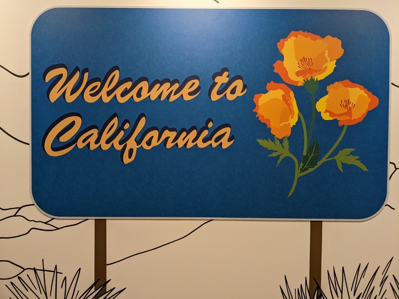 painting of a sign that says welcome to California