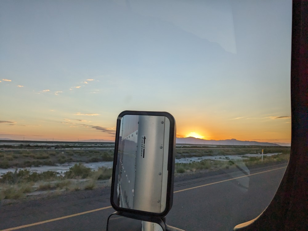 Picture taken from the driver side of a truck window at dawn