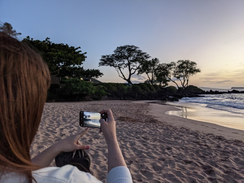 Ariel taking a picture of the beach