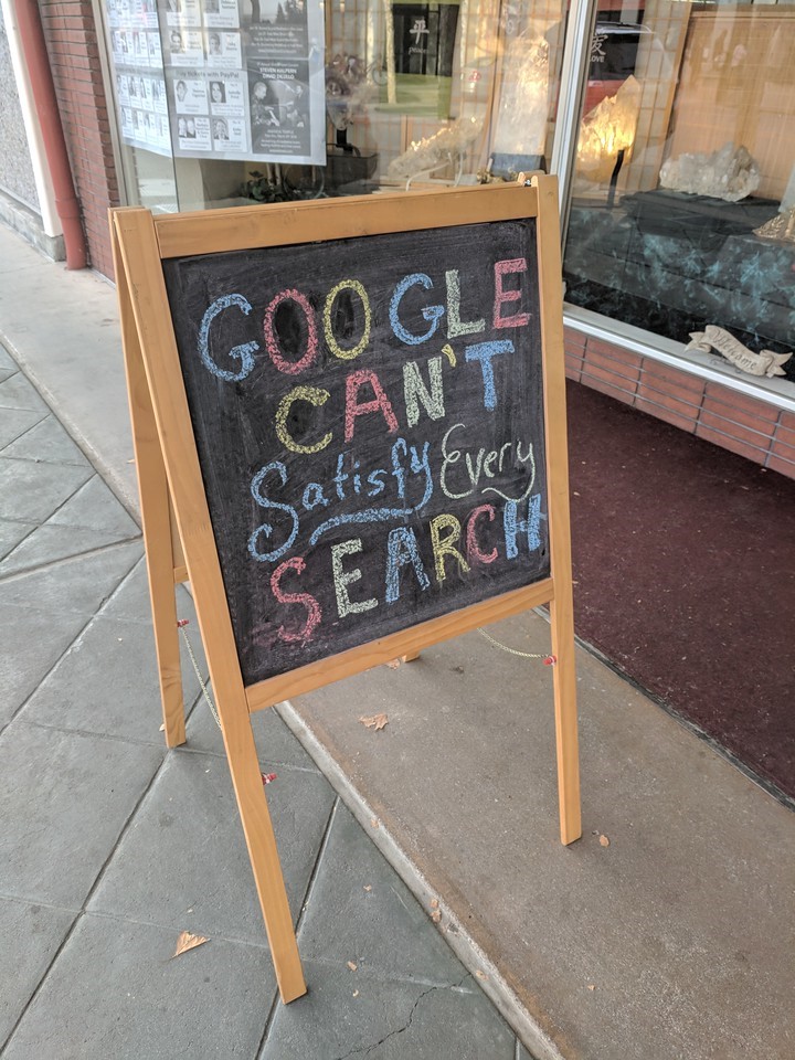 sign that says google can't satisfy every search